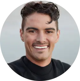 Portrait of a smiling language learner used for an online tutoring testimonial