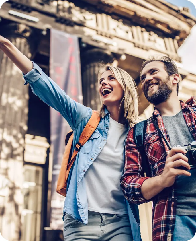 Smiling couple walking outdoors, representing real-world language use.