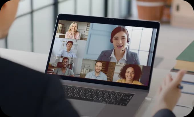 A group of language learners participating in an online tutoring session.